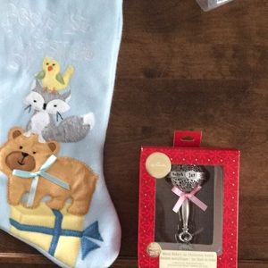 Stocking babies first Christmas and a rattle decoration for the tree.